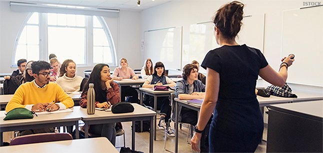 Multi-ethnic group of College students in classroom.